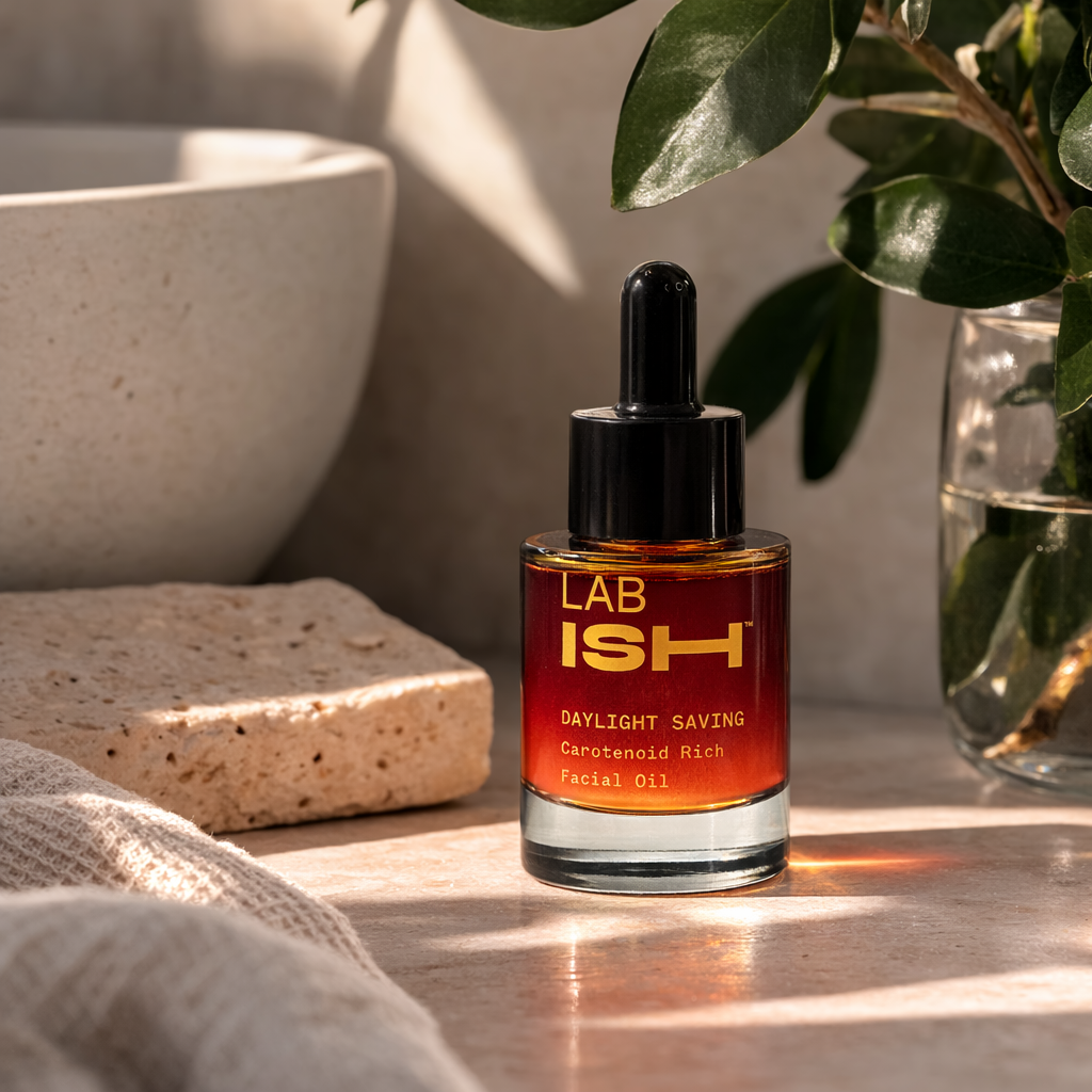 Lab Ish Daylight Saving facial oil bottle in a bathroom